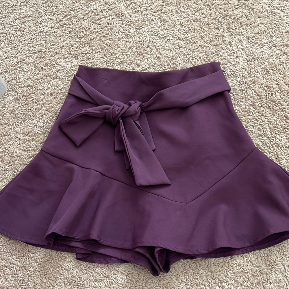 purple skirt with tie bow